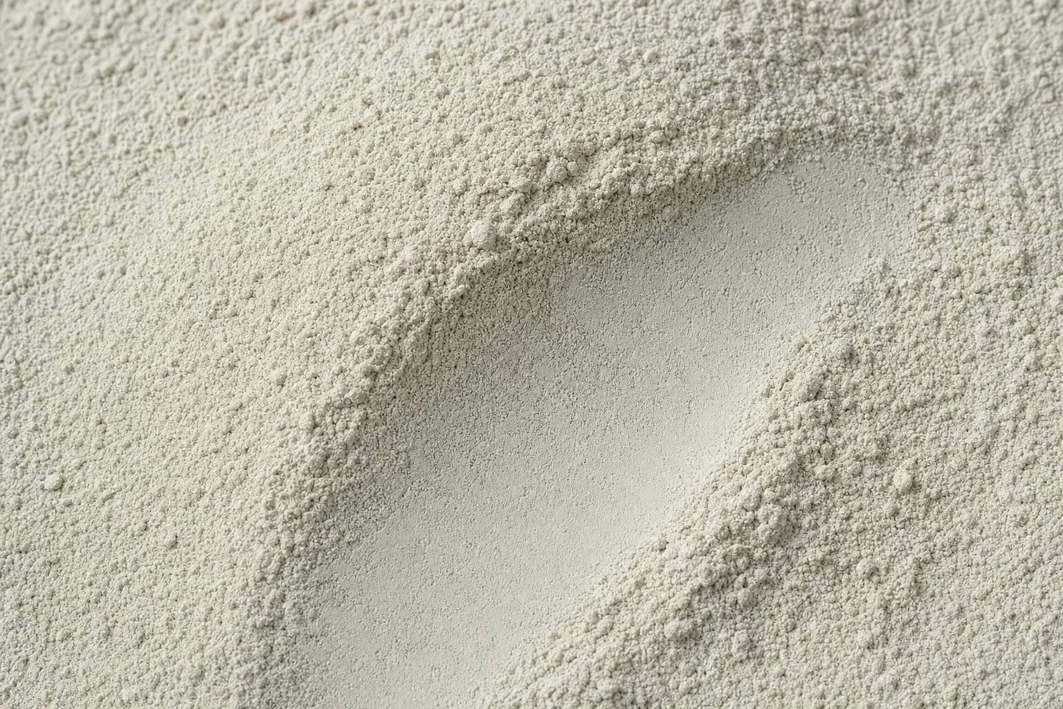 Close-up of bentonite, showing particle size and texture.