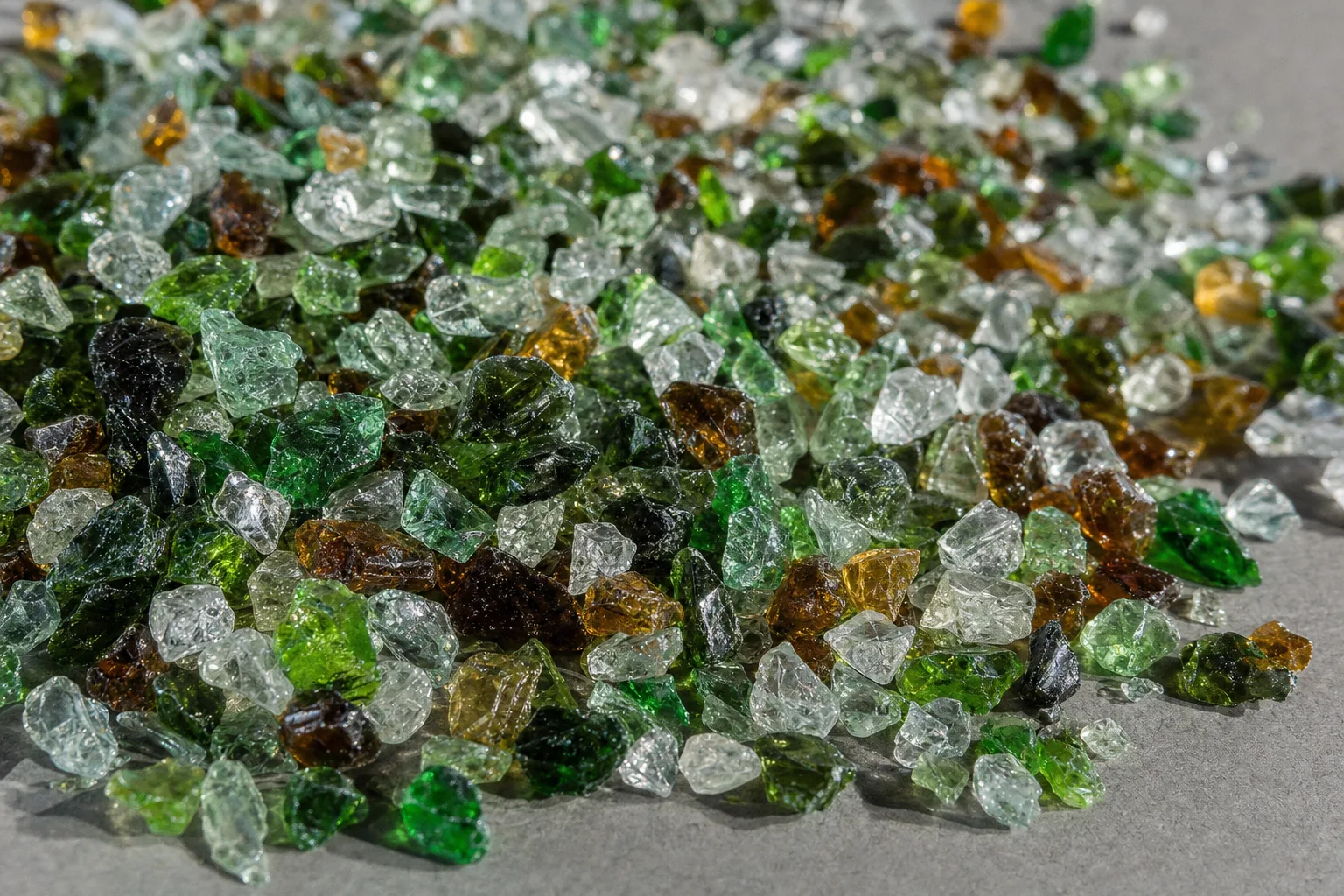 Close-up of glass cullet, showing particle size and texture.
