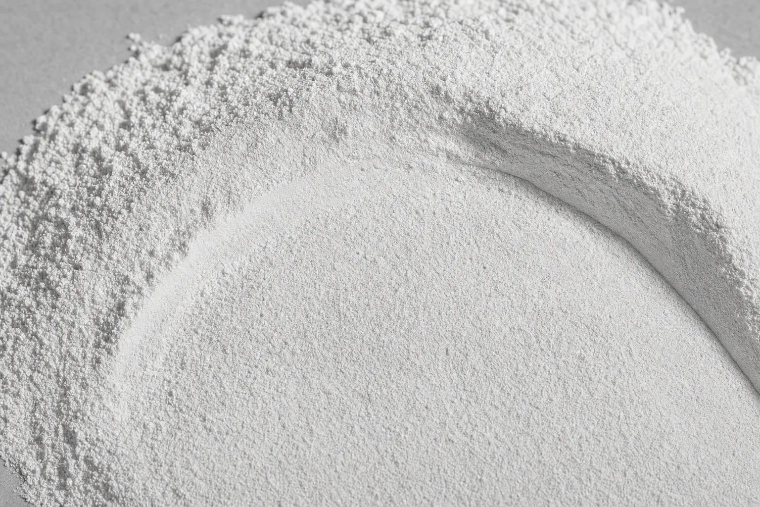 Close-up of gypsum powder, showing particle size and texture.