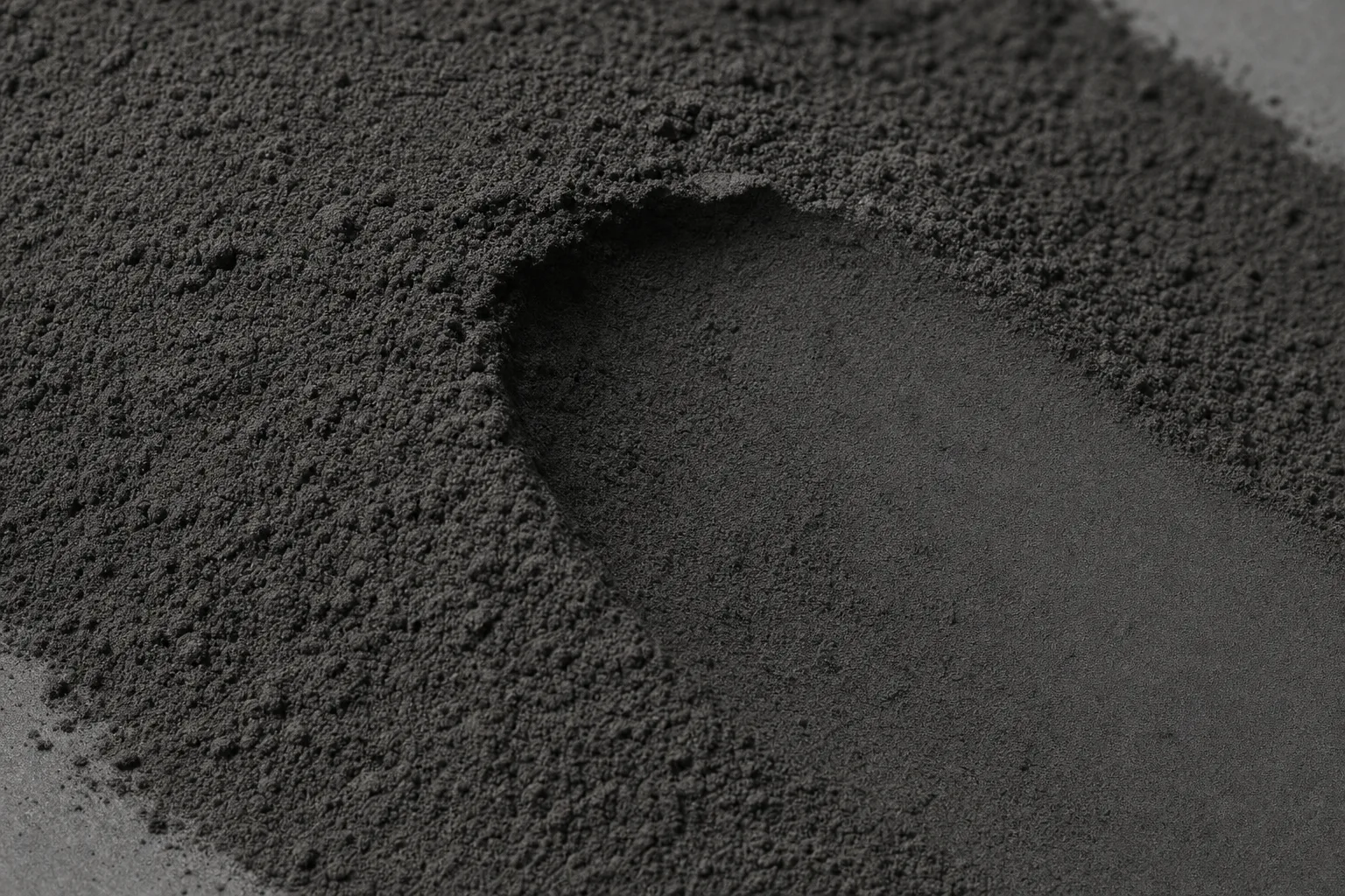 Close-up of pulverized coal, showing particle size and texture.