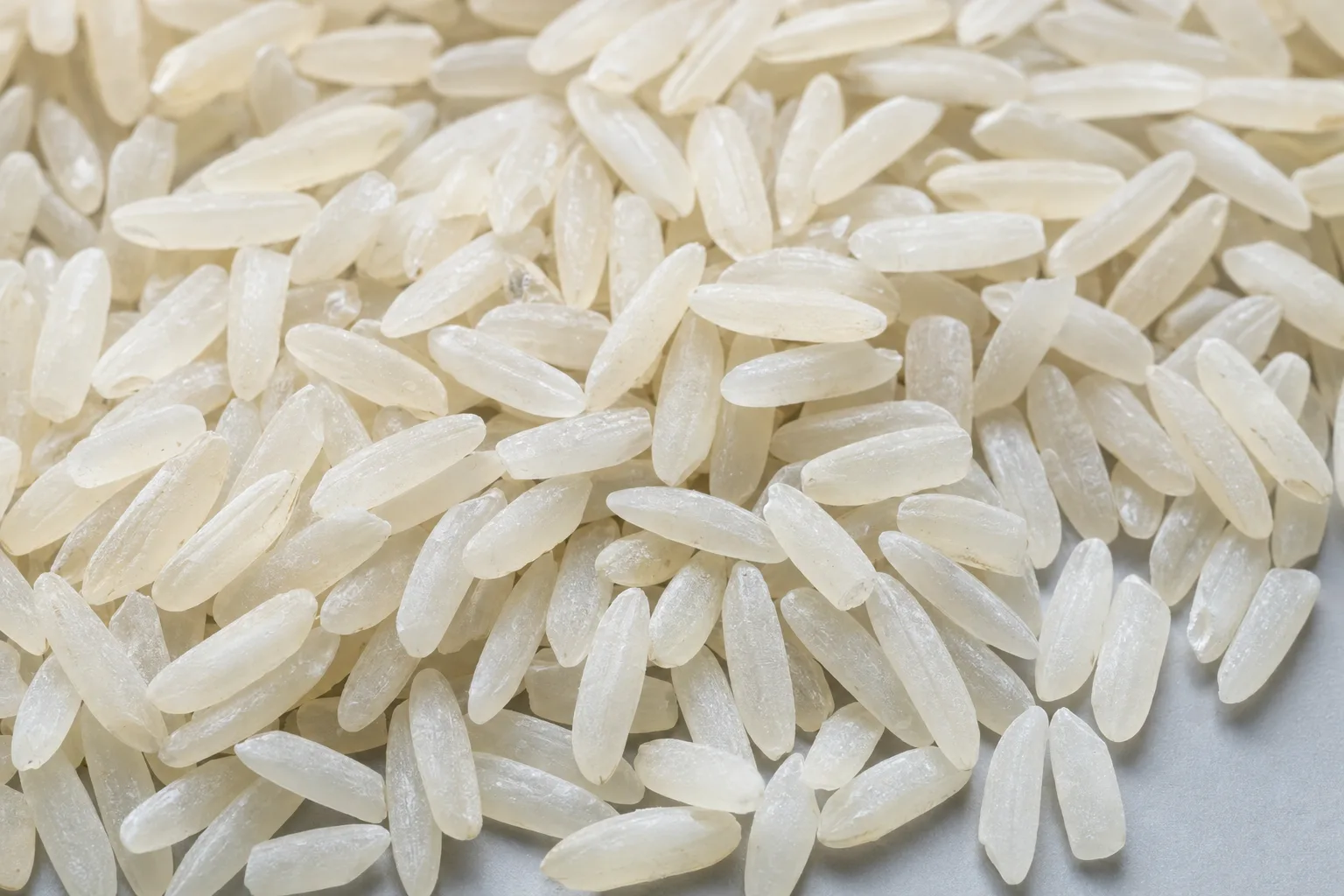 Close-up of rice, showing particle size and texture.