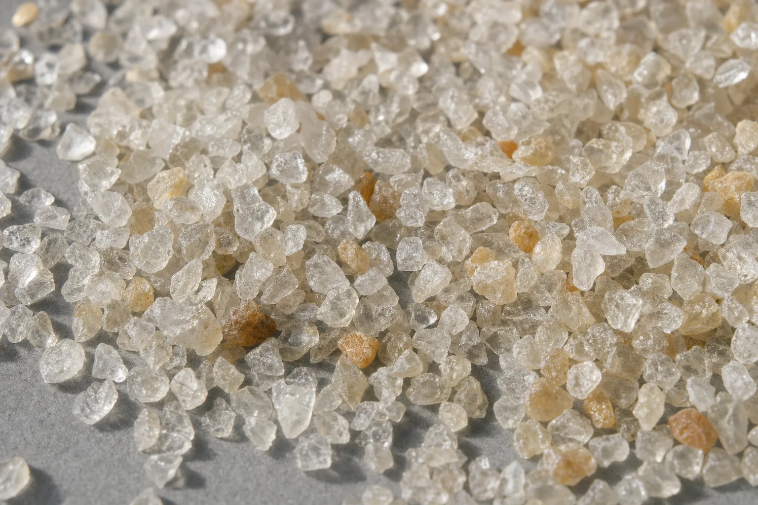 Close-up of silica sand, showing particle size and texture.